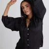 Breath Of Fresh Air Shiny Black Ls Puff Sleeve Button Front Top 1 Breath Of Fresh Air Shiny Black Ls Puff Sleeve Button Front Top -Fashion Clothing Store 6190FF8B 83E9 41EE B317 1E4984CD4D6F 1 201 a