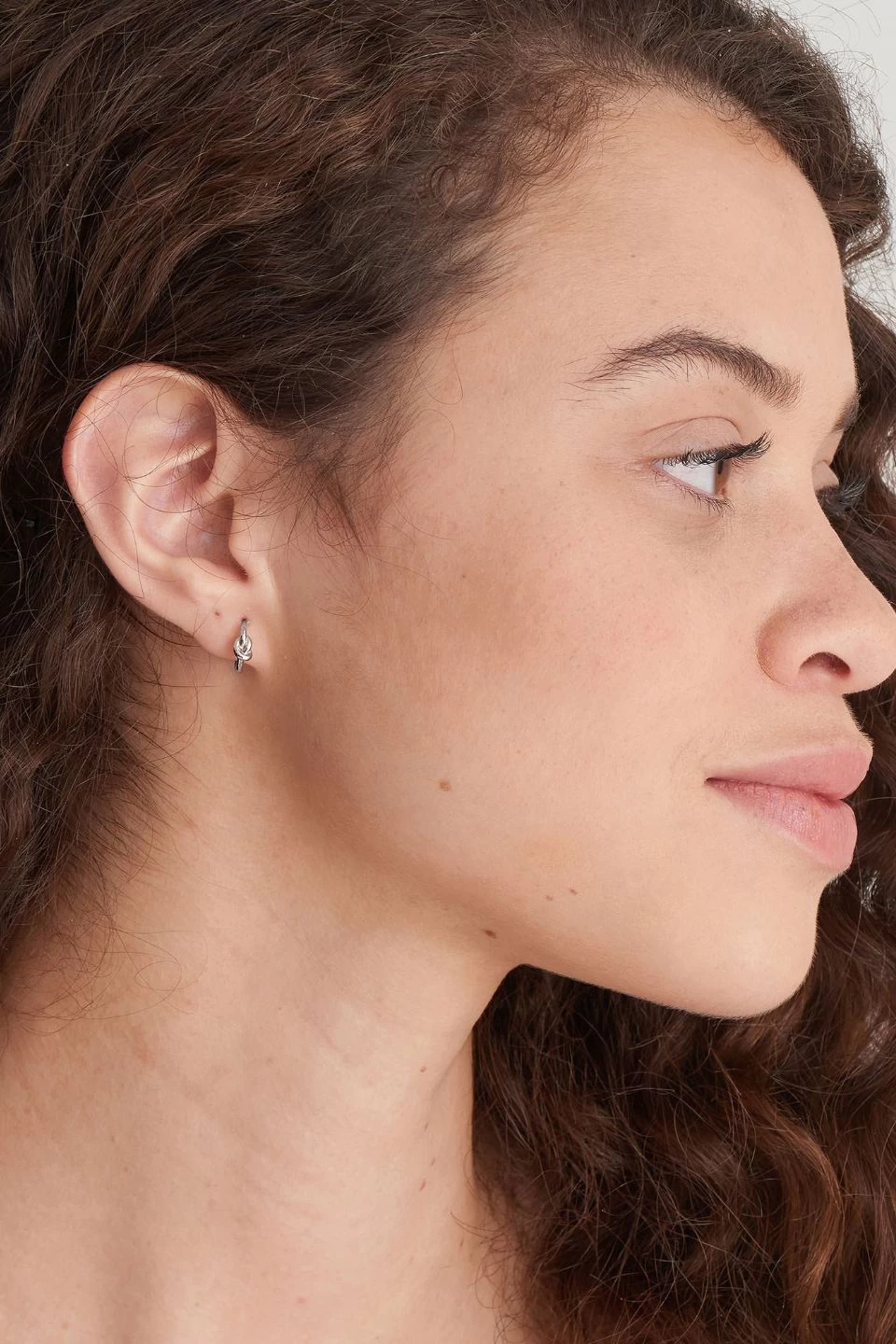 Ania Haie Forget Me Knot Huggie Hoop Silver 12mm Earrings 4 Ania Haie Forget Me Knot Huggie Hoop Silver 12mm Earrings - Image 2