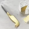Santo Single Gold Cheese Knife 2 Santo Single Gold Cheese Knife -Fashion Clothing Store cheeseknifelife2 1400x 22bfdd4f 23bf 46a7 8ad6 950166da464f 1024x1024 1